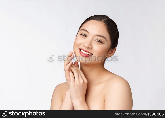 Beautiful asian woman makeup of cosmetic, girl hand touch cheek and smile, face of beauty perfect with wellness isolated on white background. Beautiful asian woman makeup of cosmetic, girl hand touch cheek and smile, face of beauty perfect with wellness isolated on white background.