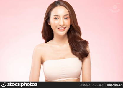 Beautiful Asian woman smile with clean and fresh skin Happiness and cheerful with positive emotional,isolated on pink background,Beauty Cosmetics and spa Treatment Concept
