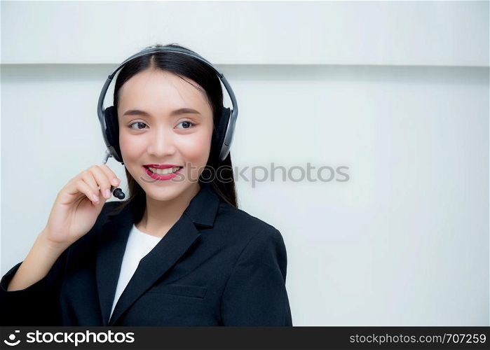 Beautiful asian woman smiling customer service talking on headset. Business concept.