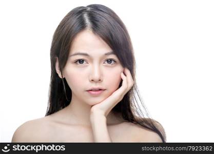 Beautiful Asian woman touching perfect face skin . Healthy skincare concept looking at camera.