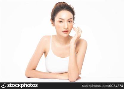 Beautiful Asian woman touching soft cheek smile with clean and fresh skin Happiness and cheerful with positive emotional,isolated on white background,Beauty Cosmetics and spa Treatment Concept