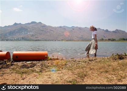 Beautiful asian woman traveling in nature. Summer vacation. Freedom concept