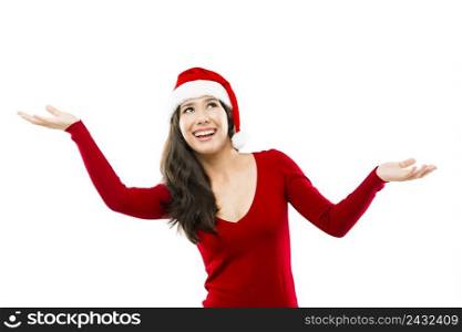 Beautiful asian woman wearing Santa’s hat looking up with arms open, isolated on white