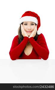 Beautiful asian woman with a beautiful smile wearing Santa’s hat,  isolated on white