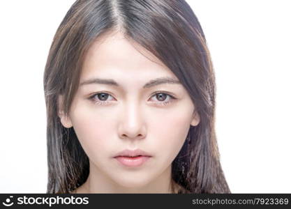 Beautiful Asian woman with perfect skin . Healthy skincare concept looking at camera.