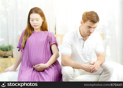 Beautiful asian young woman pregnant and husband with problem relationship, unhappy and stress, family with abortion concept.
