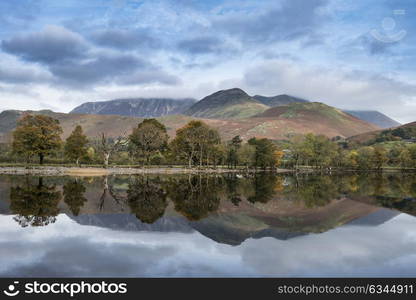 Beautiful Autumn Fall landscape image of Lake Buttermere in Lake District England