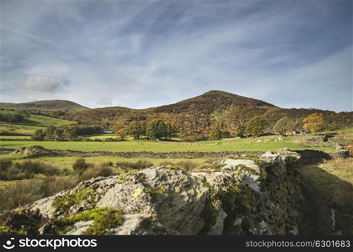 Beautiful Autumn Fall landscape image of wide countryside in Lake District in England