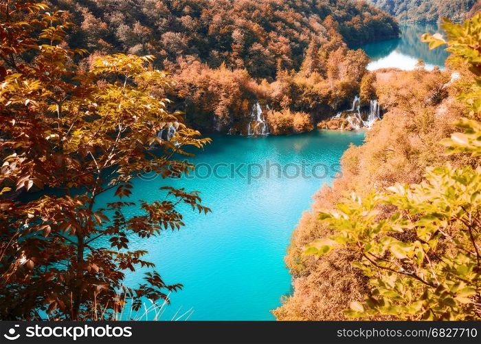 Beautiful autumn forest, lake and waterfall. Plitvice National Park, Croatia.