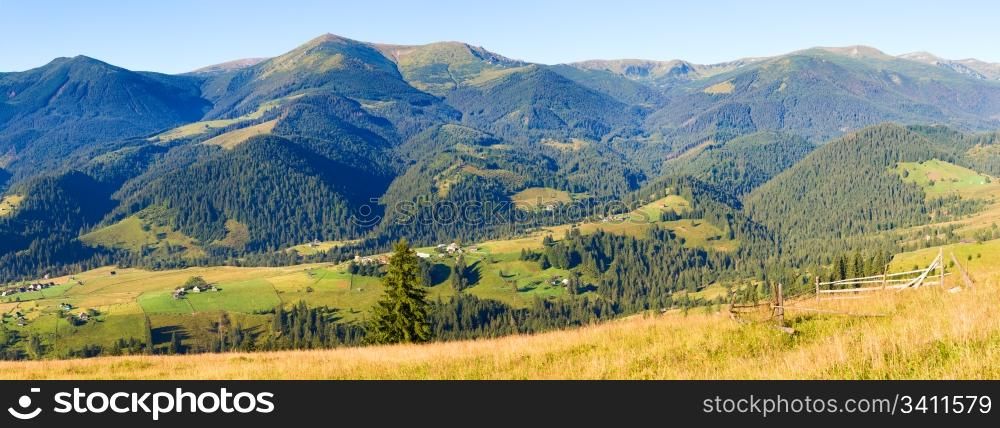 Beautiful autumn mountain country panorama (Carpathian Mount, Ukraine). Eight shots stitch image.