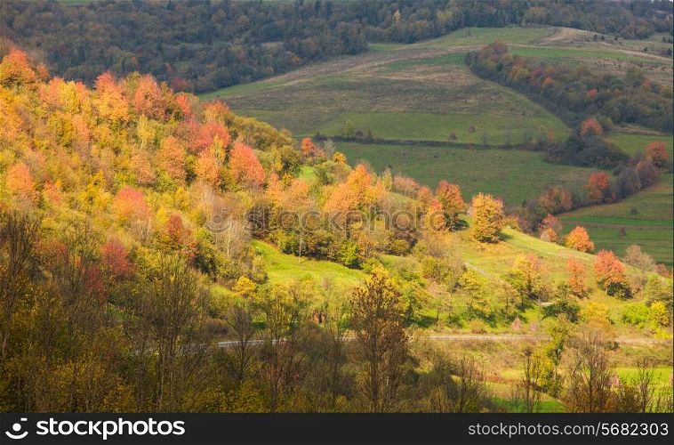 Beautiful autumnal landscape. Road throw the Carpathian mountains