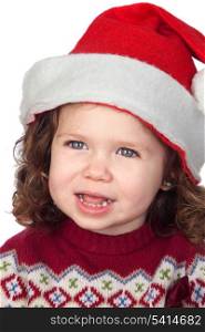 Beautiful baby girl with Christmas cap isolated over white background