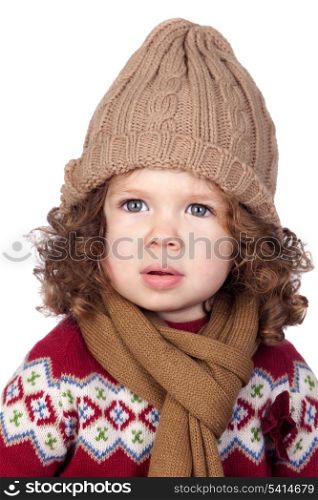 Beautiful baby girl with wool cap isolated over white background