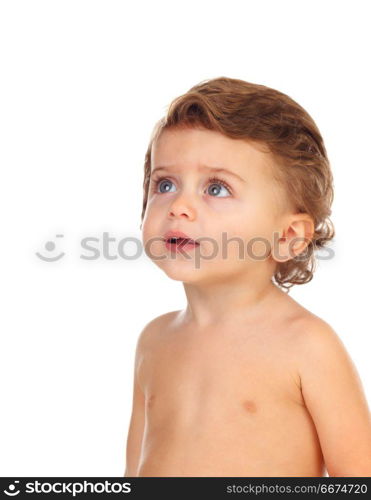 Beautiful baby looking up. Beautiful baby looking up isolated on a white background