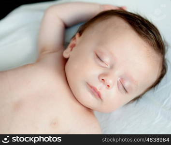 Beautiful baby sleeping the nap in the crib