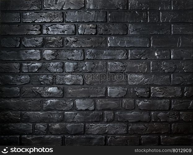 Beautiful background made of old black bricks