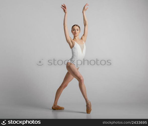beautiful ballerina posing full shot