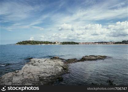 Beautiful bay near Rovinj, clear water and stony beach, Croatia