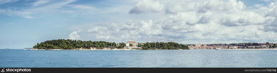 Beautiful bay near Rovinj, clear water and stony beach, Croatia