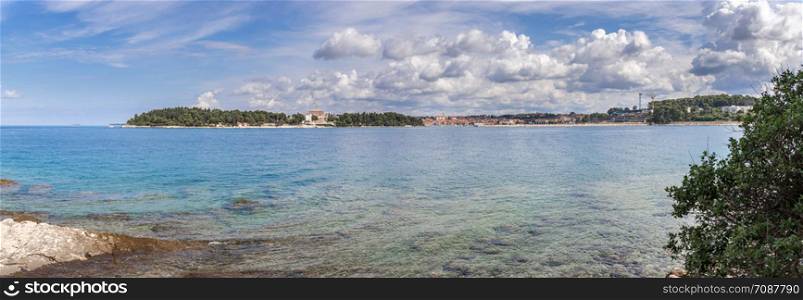 Beautiful bay near Rovinj, clear water and stony beach, Croatia