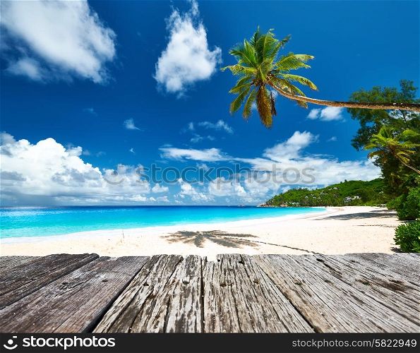 Beautiful beach and old wooden pier at Seychelles, Mahe