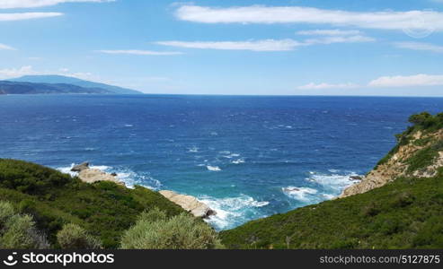 Beautiful beach on Skiathos island in Greece, windy summer day in June