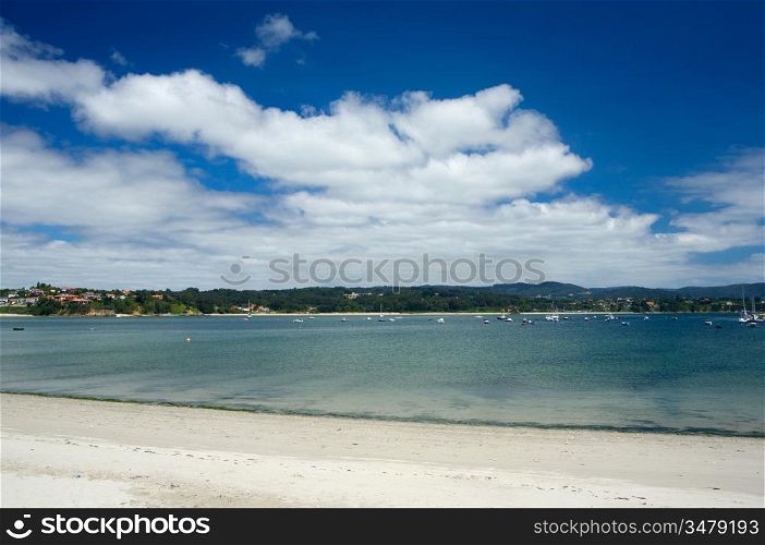 beautiful beach with blue sky and clouds