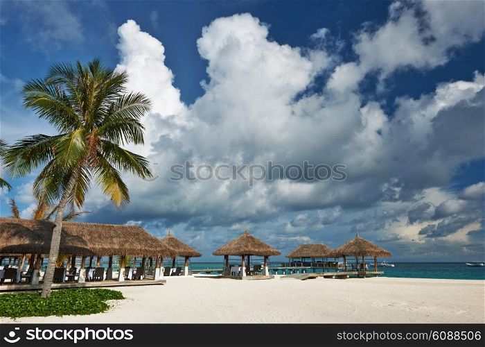 Beautiful beach with bungalow jetty at Maldives