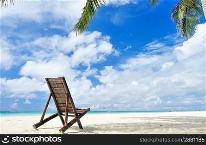 Beautiful beach with chaise lounge