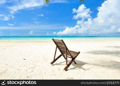 Beautiful beach with chaise lounge