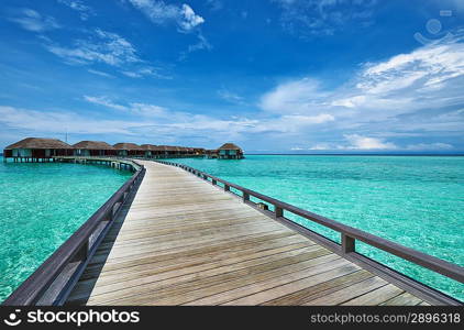 Beautiful beach with water bungalows at Maldives