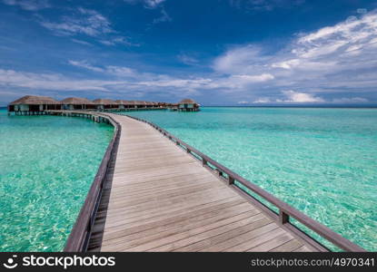 Beautiful beach with water bungalows at Maldives