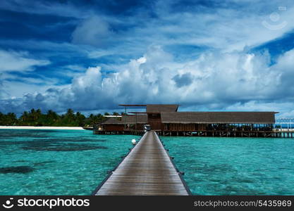 Beautiful beach with water bungalows at Maldives