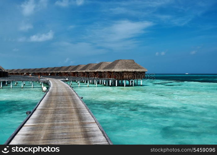 Beautiful beach with water bungalows at Maldives