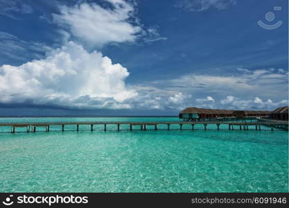 Beautiful beach with water bungalows at Maldives