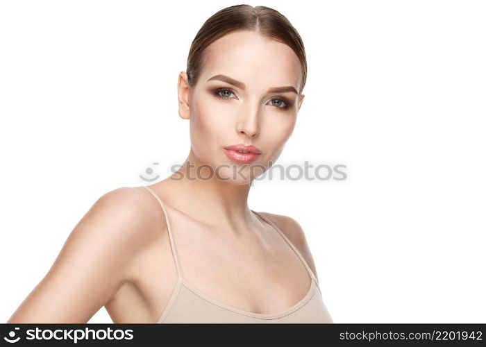 Beautiful Beauty and face care concept - Beautiful Young Woman with Clean Fresh Skin standing over light grey background. Young Woman with Clean Fresh Skin isolated on white background. Beautiful Young Woman with Clean Fresh Skin isolated on white background