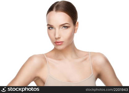 Beautiful Beauty and face care concept - Beautiful Young Woman with Clean Fresh Skin standing over light grey background. Young Woman with Clean Fresh Skin isolated on white background. Beautiful Young Woman with Clean Fresh Skin isolated on white background