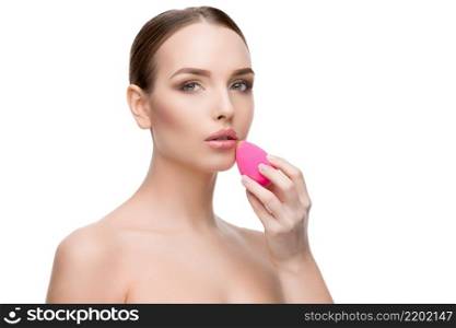 Beautiful Beauty and face care concept - Beautiful Young Woman with Clean Fresh Skin using beauty egg isolated on white background. Beautiful Young Woman with Clean Fresh Skin using beauty egg isolated on white background