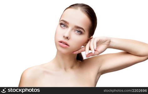 Beautiful Beauty and face care concept - Beautiful Young Woman with Clean Fresh Skin standing over light grey background. Young Woman with Clean Fresh Skin isolated on white background. Beautiful Young Woman with Clean Fresh Skin isolated on white background