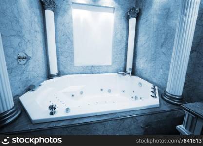 beautiful big bath in the marble bathroom