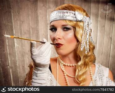 beautiful blond flapper girl smoking