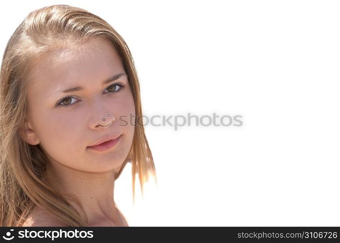 Beautiful blond girl outdoors against the white isolated background.