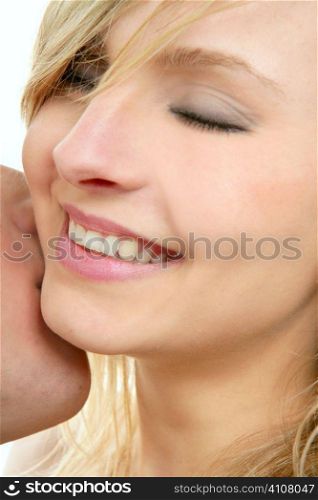 Beautiful blond woman portrait close up kissing man