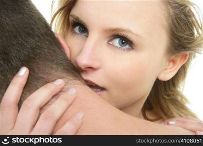 Beautiful blond woman portrait close up kissing man