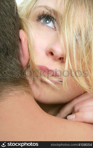 Beautiful blond woman portrait, hug with a man, close up