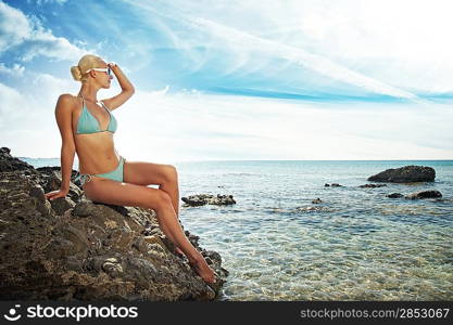 Beautiful blond woman relaxing in the sea