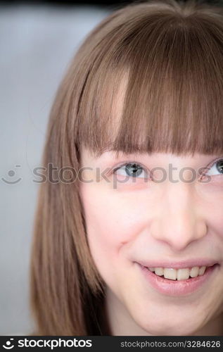 beautiful blond young woman close up half face