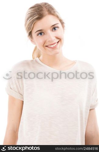 Beautiful blonde girl smiling over a white background