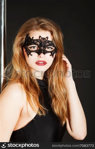 beautiful blonde in black mask