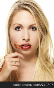 beautiful blonde woman after eating chocolate. beautiful blonde woman after eating chocolate on white background